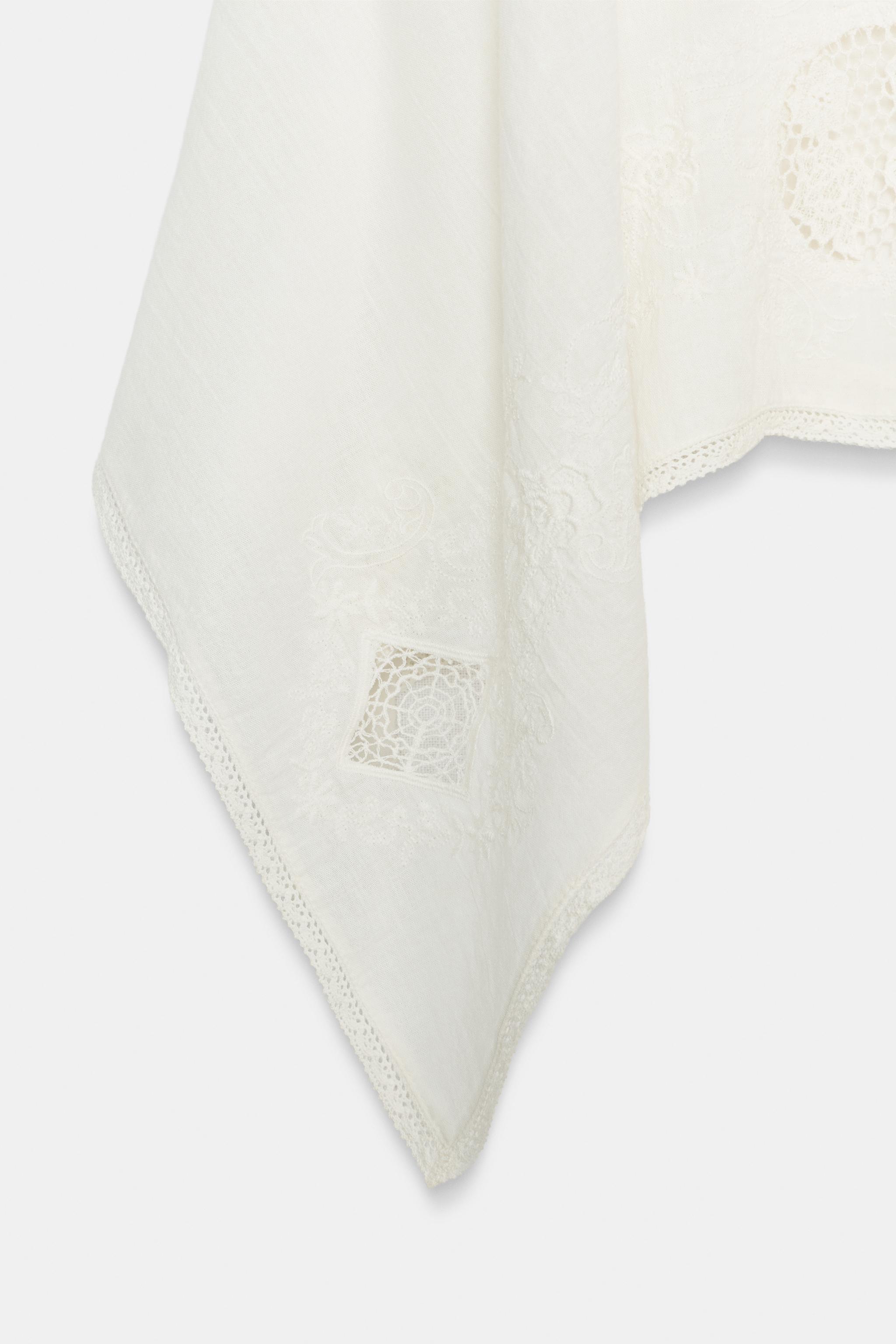 ASYMMETRIC EMBROIDERED GAUZE TOP